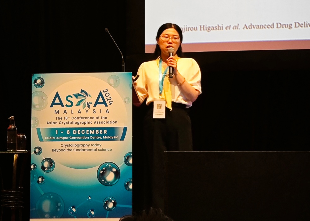 Wang delivering an academic presentation at the 2024 Asian Crystallographic Association (AsCA) conference Wang delivering an academic presentation at the 2024 Asian Crystallographic Association (AsCA) conference